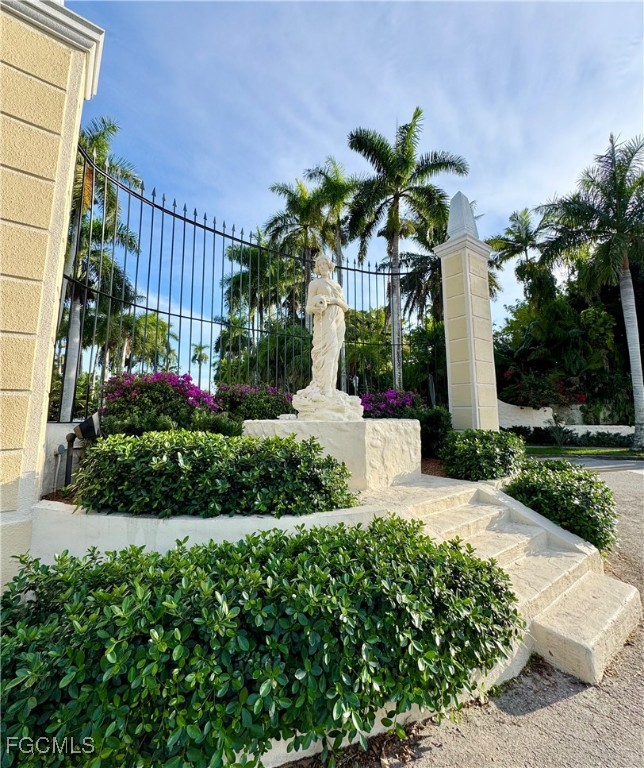1640 Marlyn Road Fort Myers, FL 33901 - Photo 48 of 48 a front view of a house with a yard and potted plants