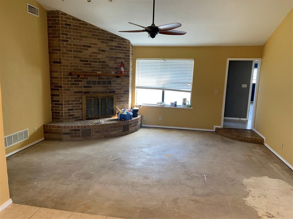 781 January Lane Ponder, TX 76259 - Photo 13 of 25 a view of a livingroom with a fireplace
