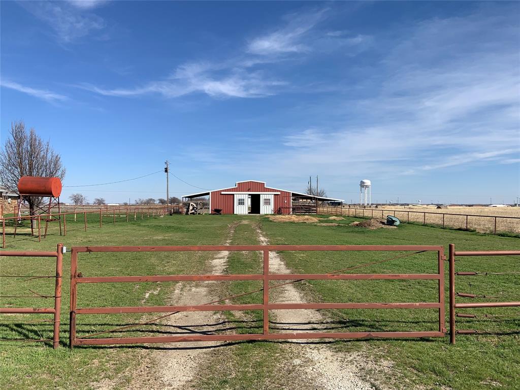 781 January Lane Ponder, TX 76259 - Photo 5 of 25 a view of a street from a yard