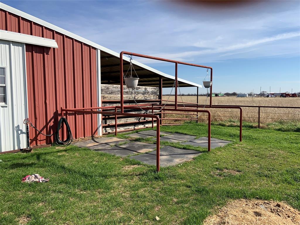 781 January Lane Ponder, TX 76259 - Photo 6 of 25 a view of backyard with trampoline