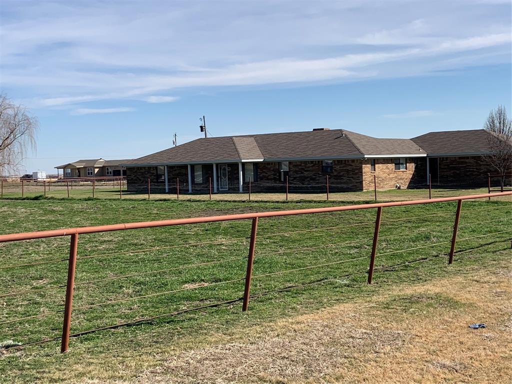 781 January Lane Ponder, TX 76259 - Photo 7 of 25 a view of a house with a yard