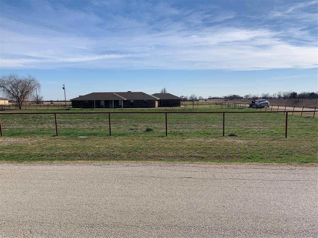 781 January Lane Ponder, TX 76259 - Photo 8 of 25 a view of green field with grass and small trees