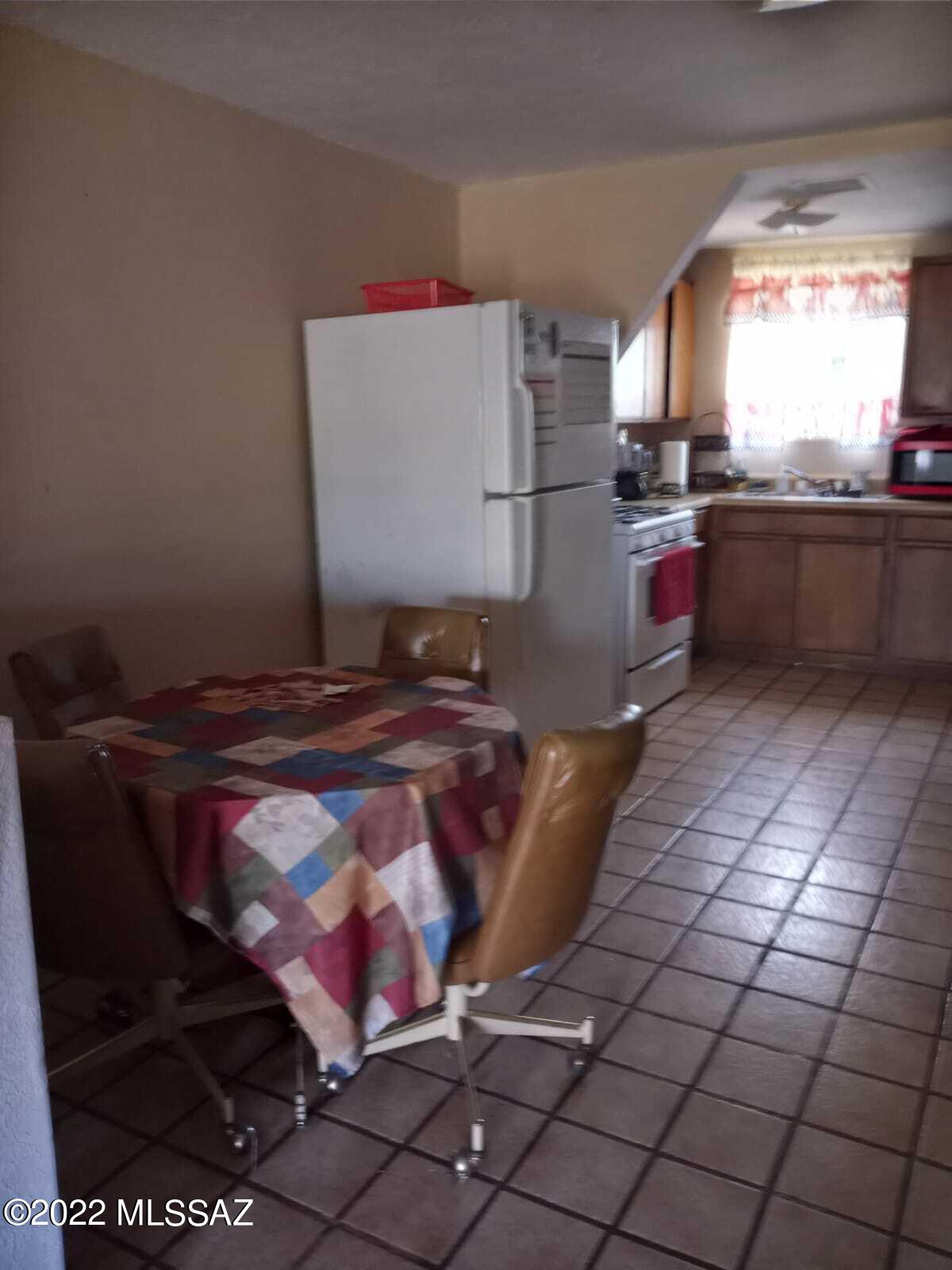 Undisclosed Address Douglas, AZ 85607 - Photo 13 of 16 a kitchen with stainless steel appliances granite countertop a sink and cabinets