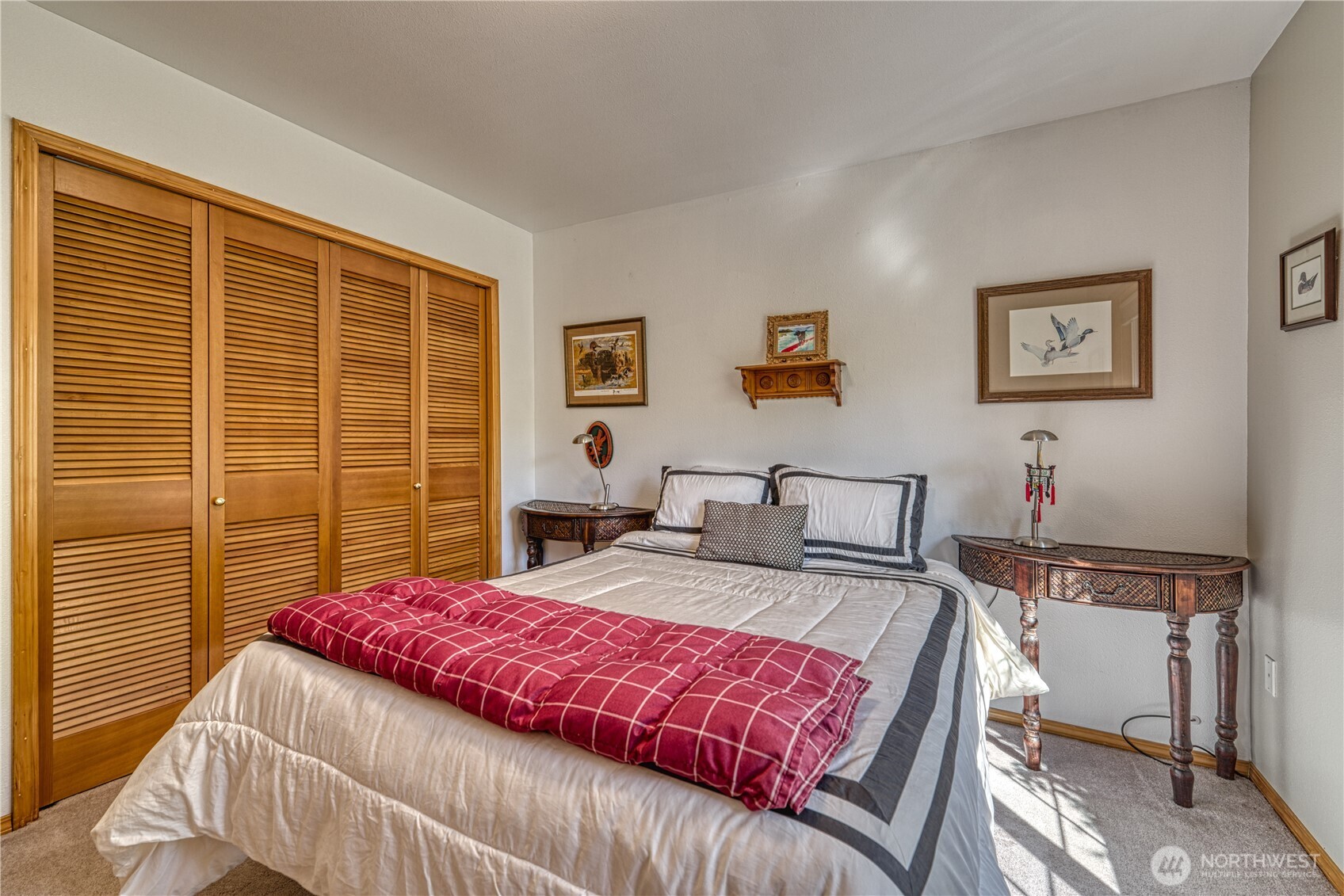 9705 346th Street South Roy, WA 98580 - Photo 20 of 34 a bedroom with a bed and a desk