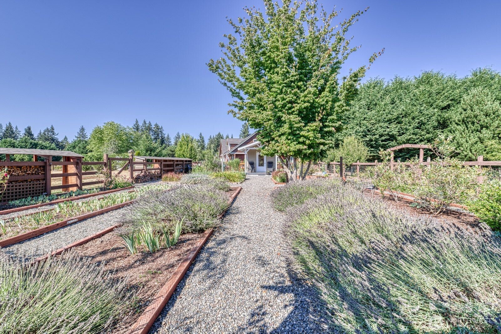9705 346th Street South Roy, WA 98580 - Photo 30 of 34 a view of a pathway with a wrought fence