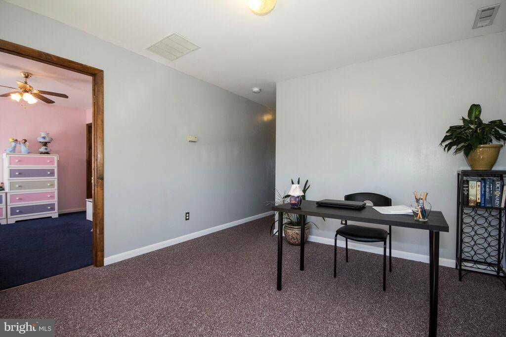 1929 Wilson Point Road Baltimore, MD 21220 - Photo 18 of 30 a view of a workspace with furniture