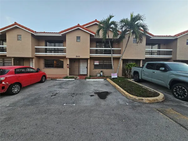 a view of a car in front of house