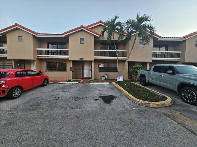 a view of a car in front of house