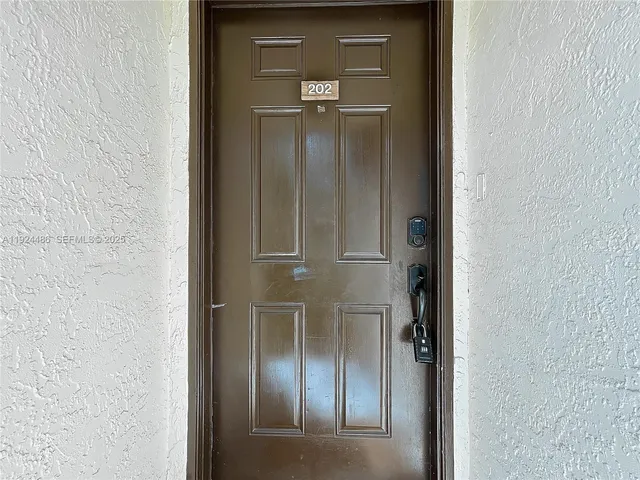 a view of living room with granite countertop furniture and fireplace