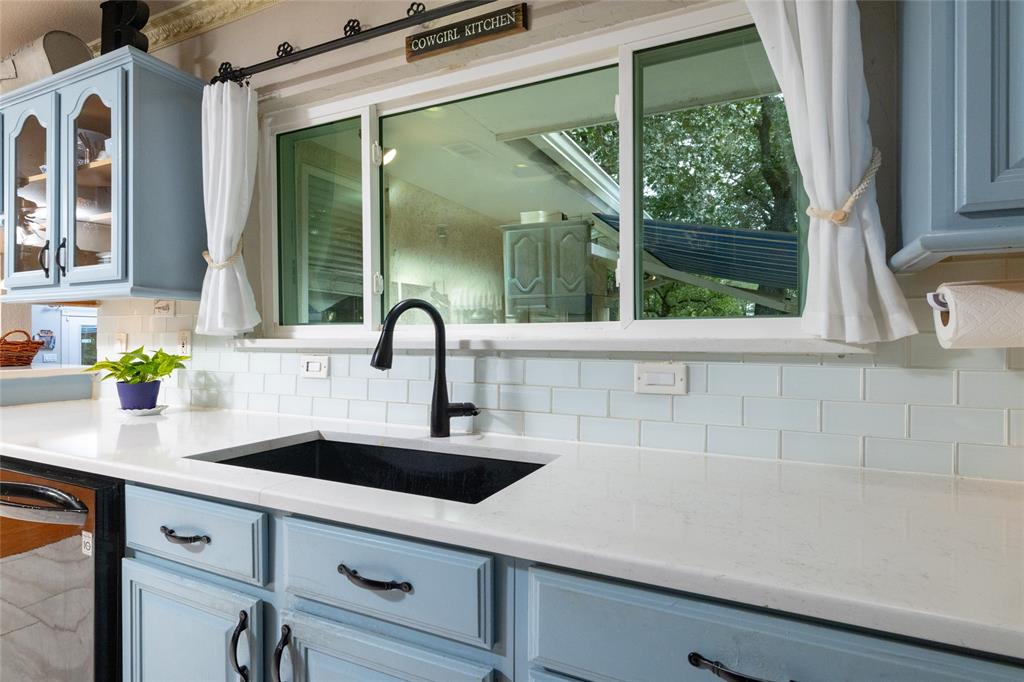 1311 Mount Gilead Road Keller, TX 76262 - Photo 15 of 40 Do the dishes with a view. Natural light pours in over this sink.