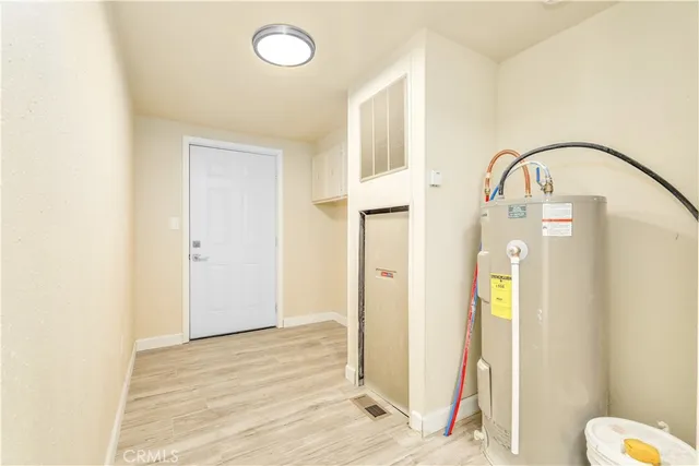 a view of wooden floor in a bathroom