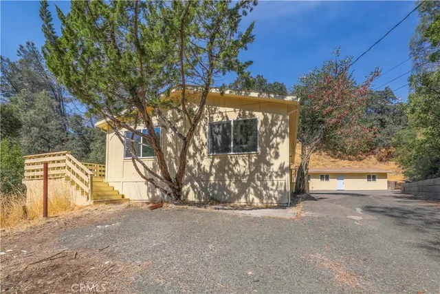 a view of a house with a snow