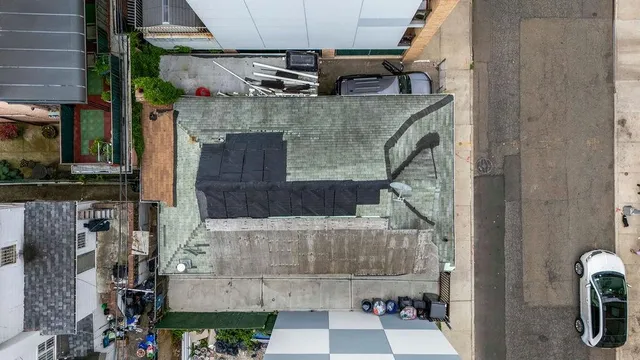 a front view of a house with garage