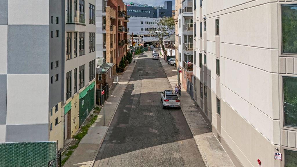 32 Brighton 2nd Place Brooklyn, NY 11235 - Photo 6 of 23 a view of a balcony with car parked