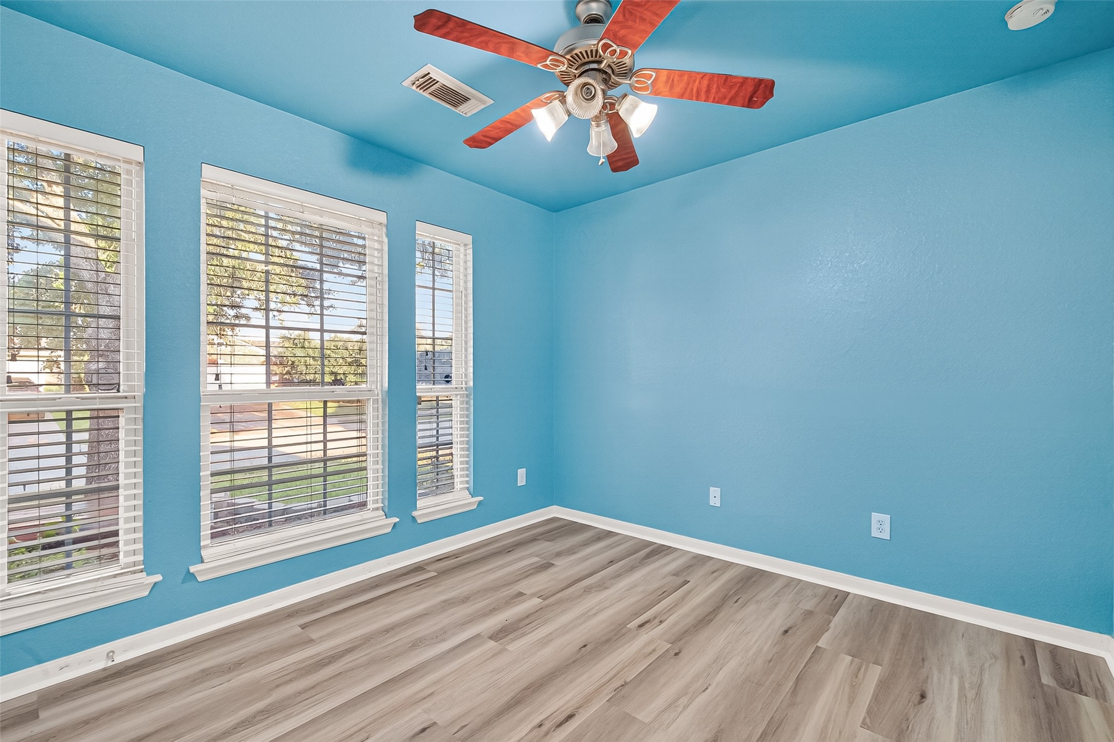 16715 Mackenzie Mesa Drive Spring, TX 77379 - Photo 26 of 50 a view of empty room with window and ceiling fan