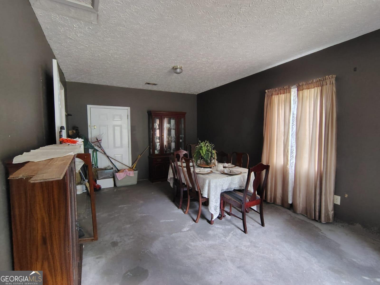 5576 Po Biddy Road Talbotton, GA 31827 - Photo 13 of 28 a living room with furniture and a window