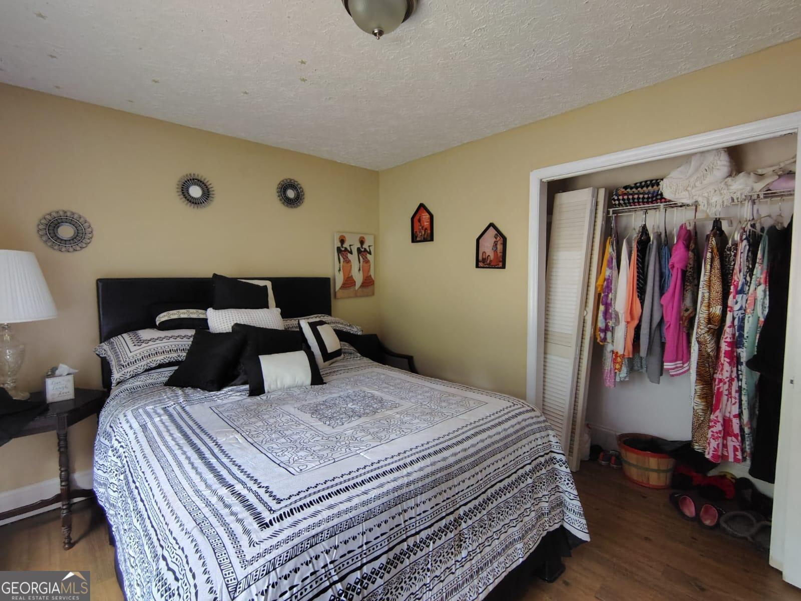 5576 Po Biddy Road Talbotton, GA 31827 - Photo 4 of 28 a bedroom with a bed and a window