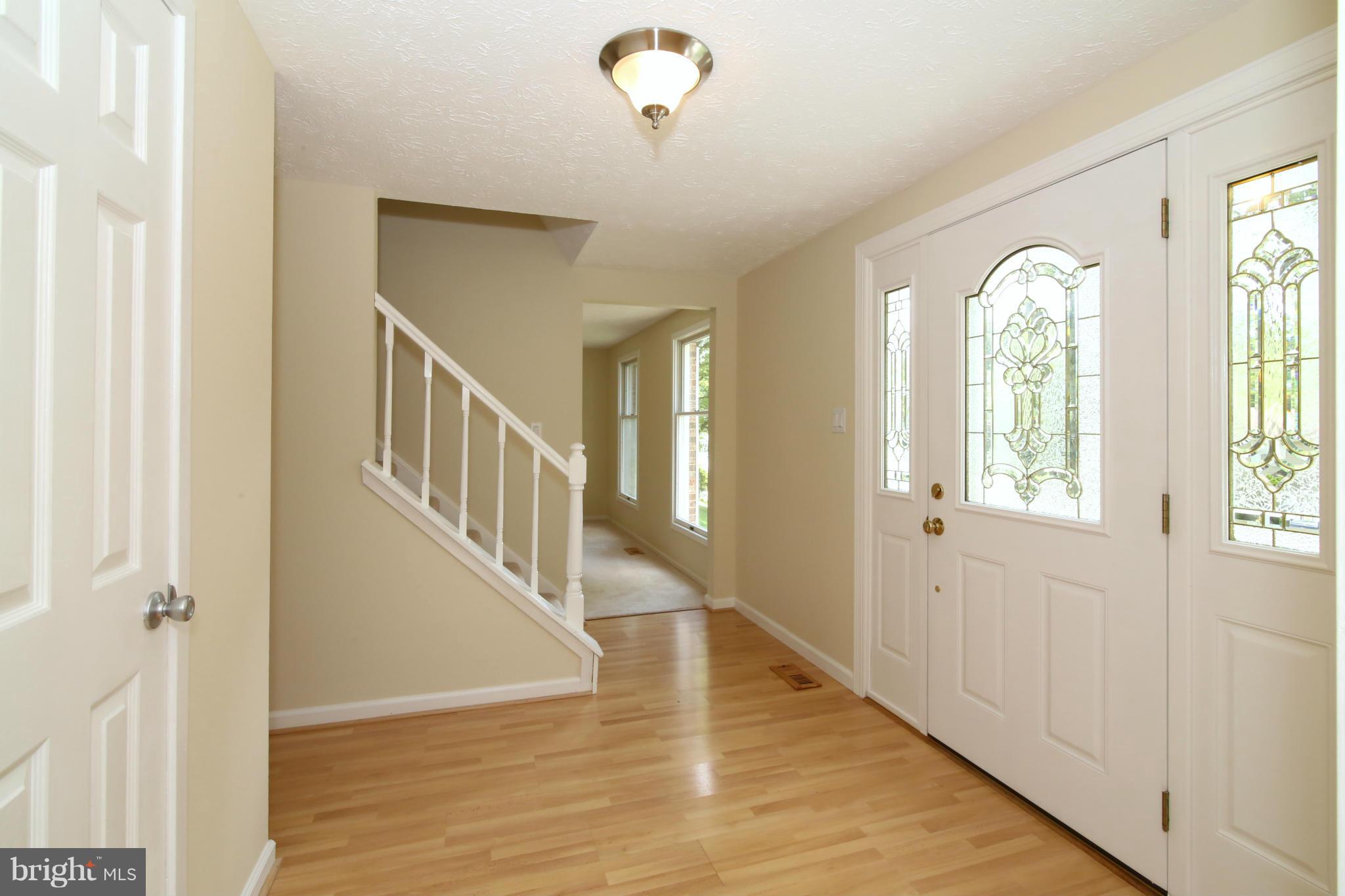 7575 Vogels Way Springfield, VA 22153 - Photo 4 of 30 a view of entryway with wooden floor