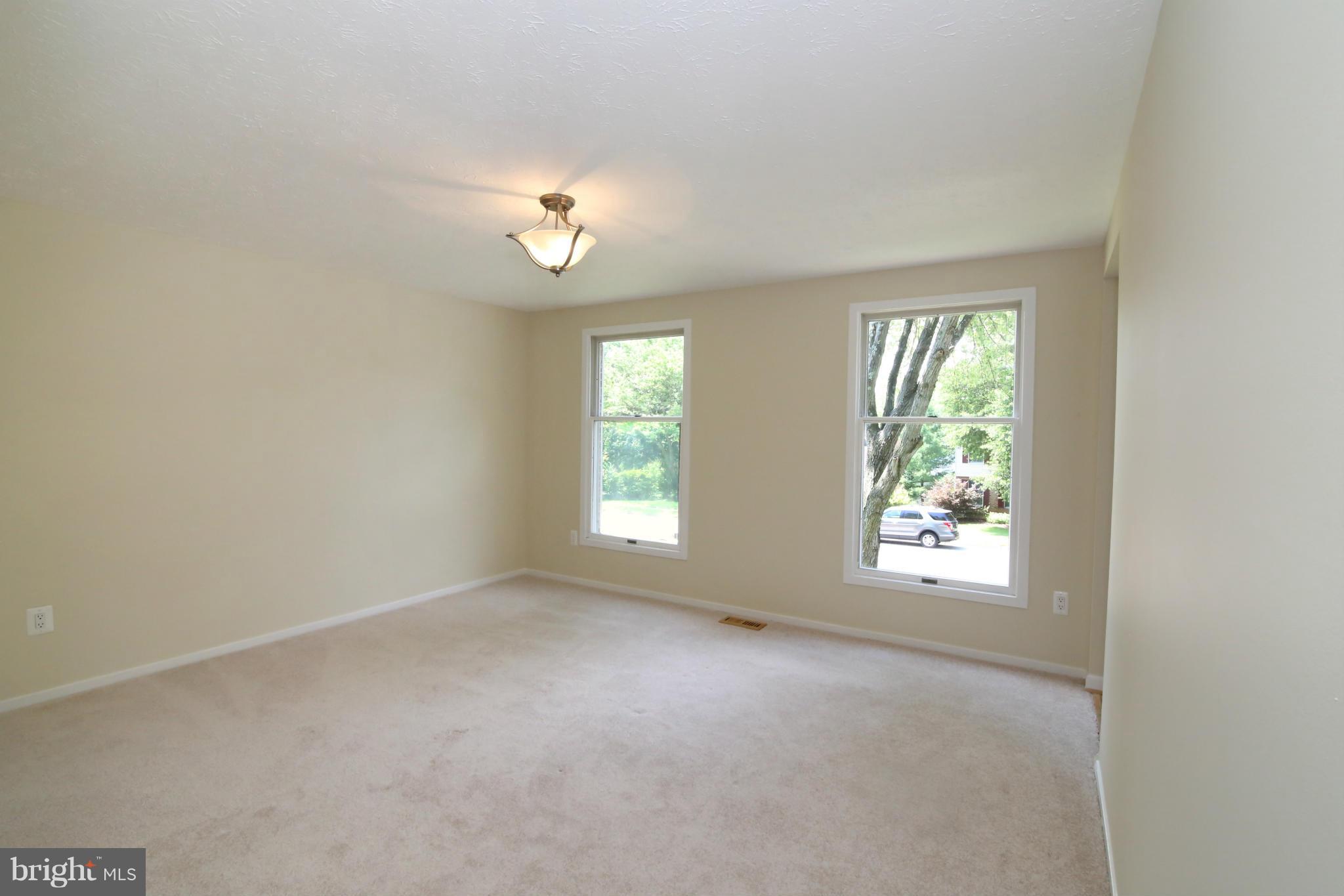 7575 Vogels Way Springfield, VA 22153 - Photo 7 of 30 an empty room with windows