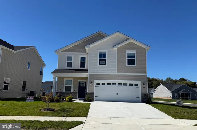 a front view of house with yard