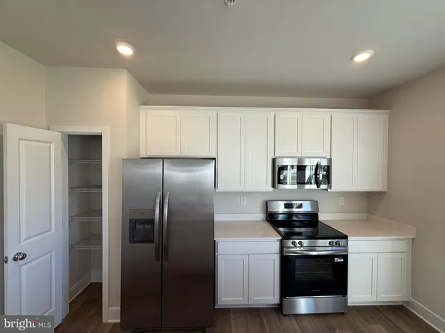 a view of entryway with stairs