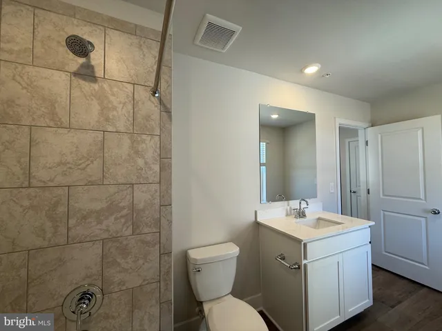 a view of a room with racks on the wall