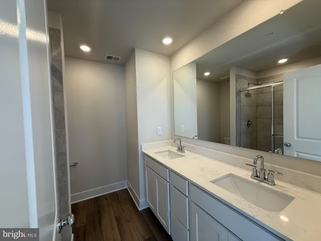 a view of an empty room and a window