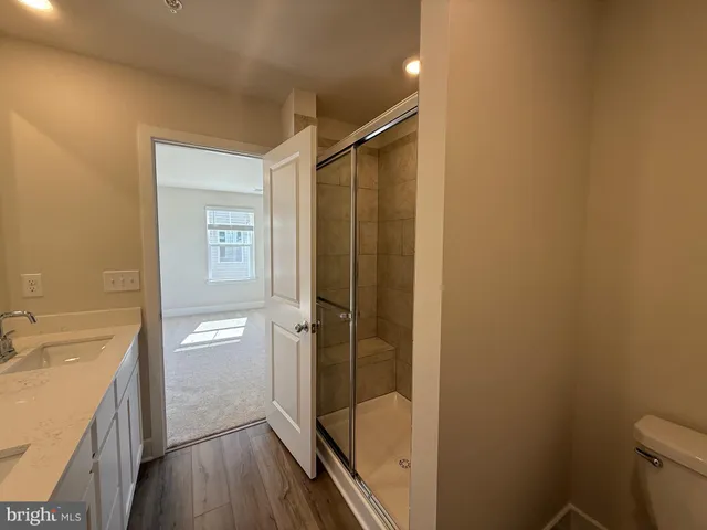 an empty room with a empty space and a window