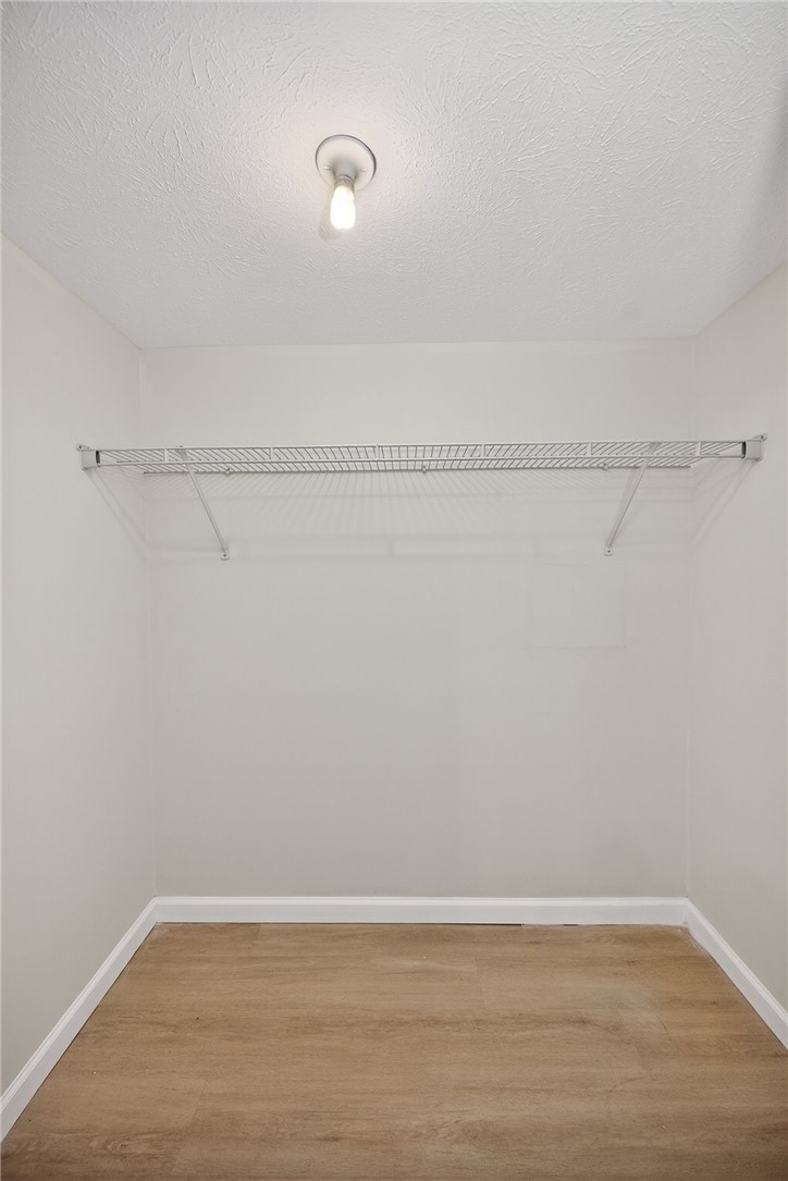 811 Wind Bluff Point Springboro, OH 45066 - Photo 41 of 51 This spacious closet offers ample storage and organization for your wardrobe essentials.