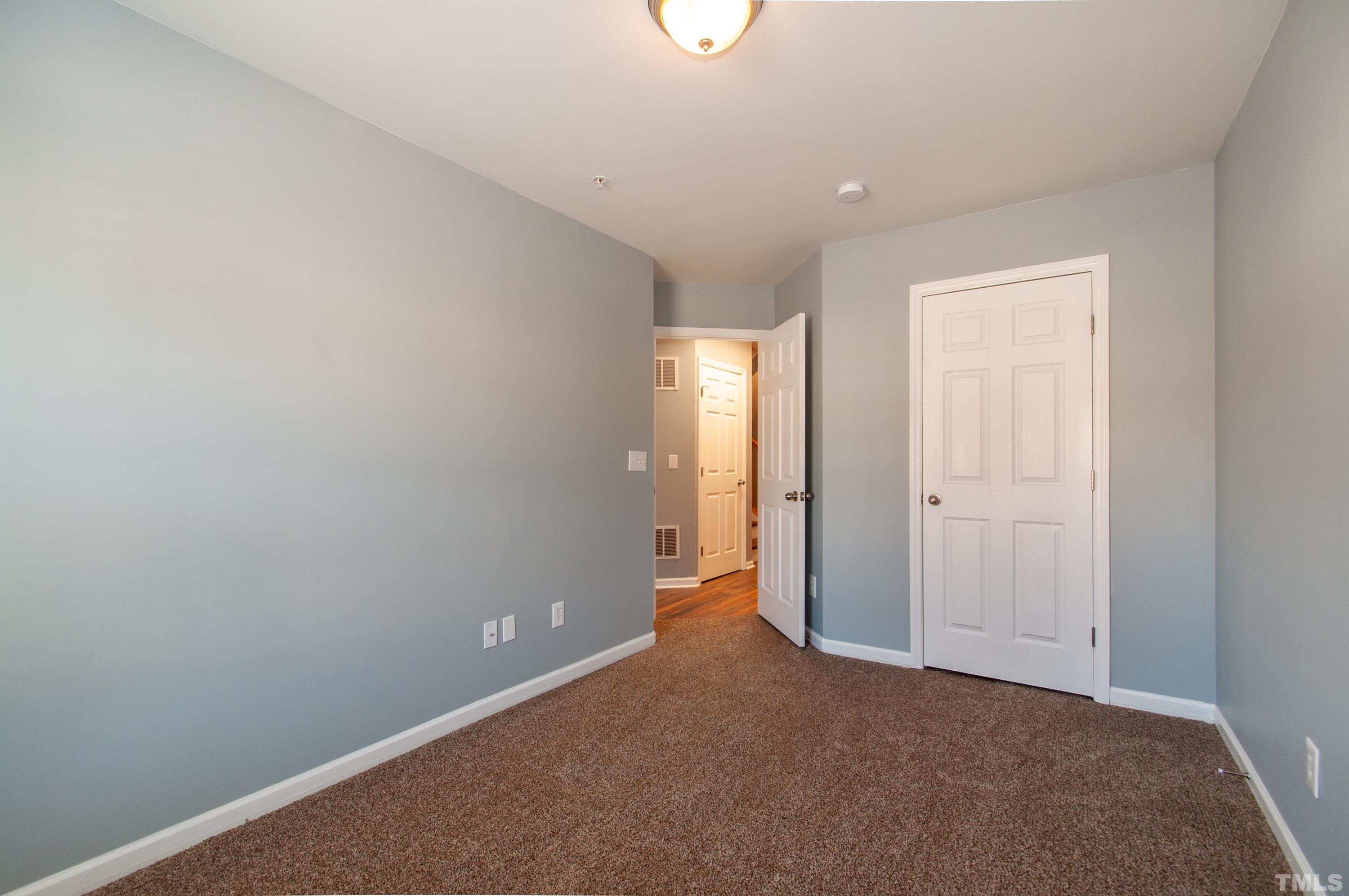 2210 Raven Road, Unit 102 Raleigh, NC 27614 - Photo 19 of 33 a view of an empty room