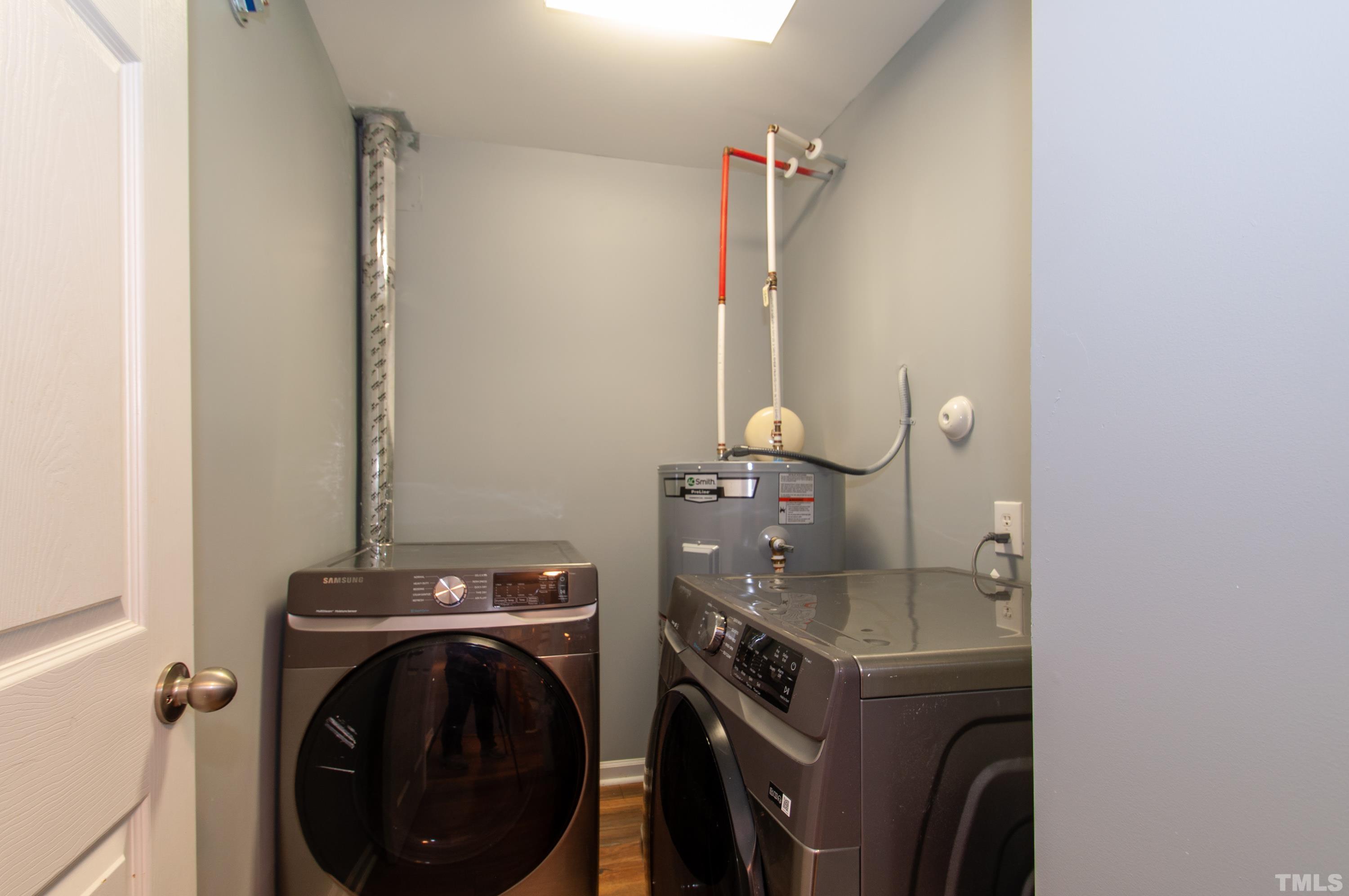 2210 Raven Road, Unit 102 Raleigh, NC 27614 - Photo 21 of 33 a utility room with dryer and washer