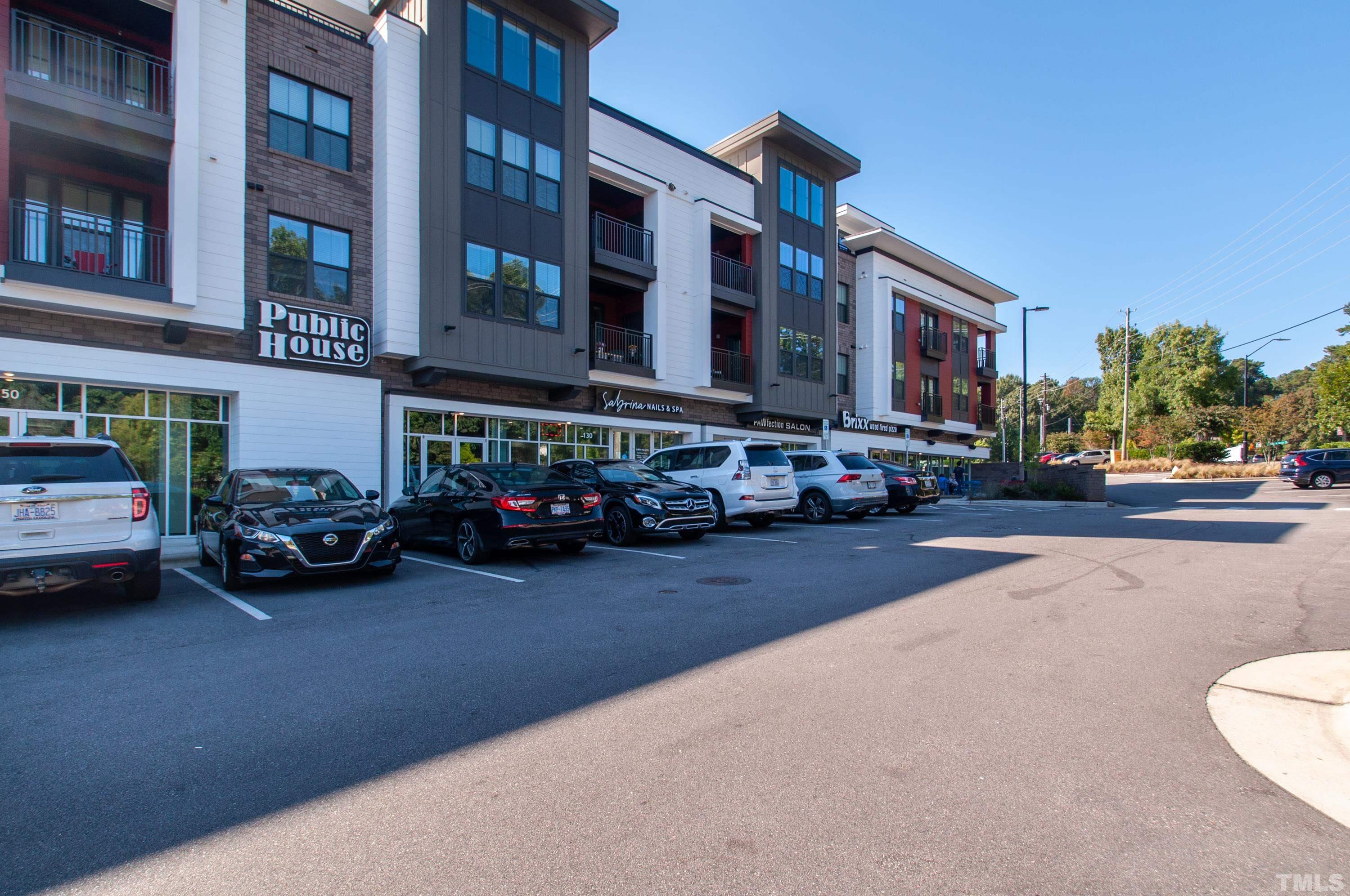 2210 Raven Road, Unit 102 Raleigh, NC 27614 - Photo 27 of 33 a view of a street with cars