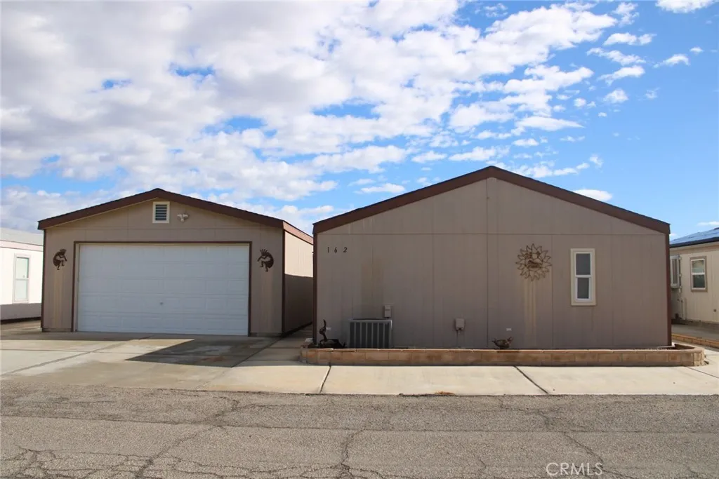a house with trees in the background