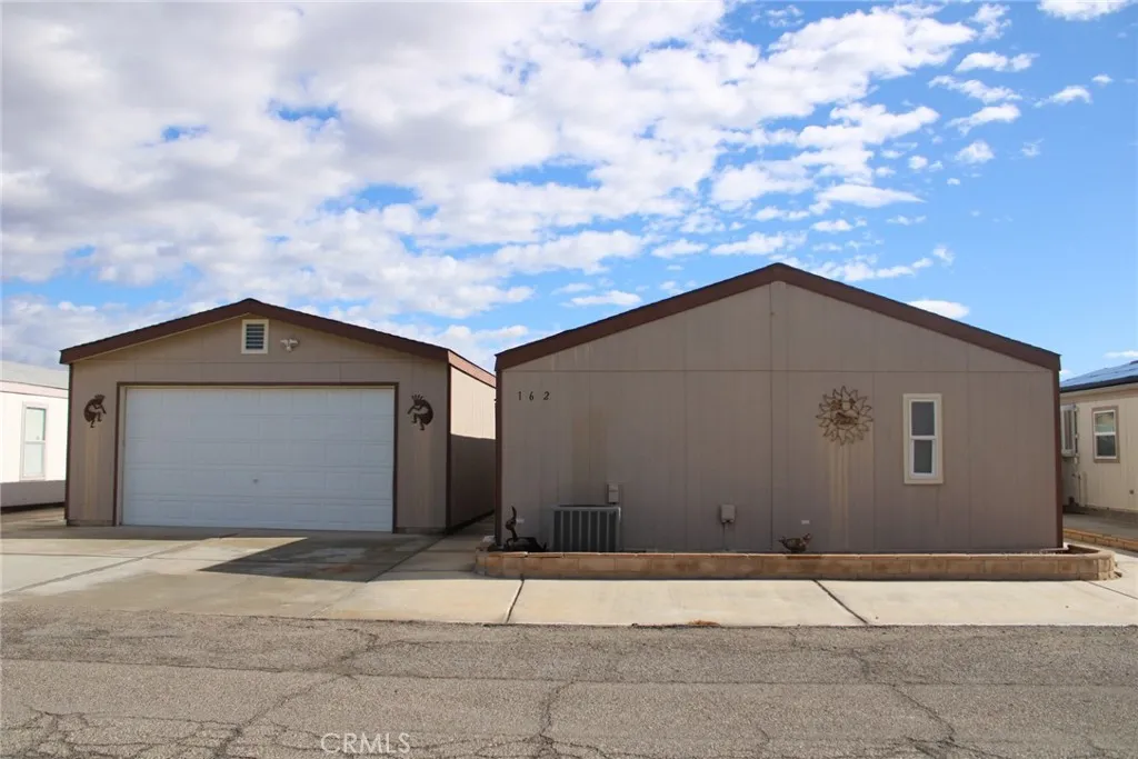 a house with trees in the background