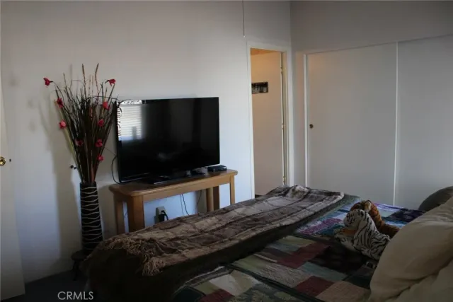 a living room with furniture window and wooden floor