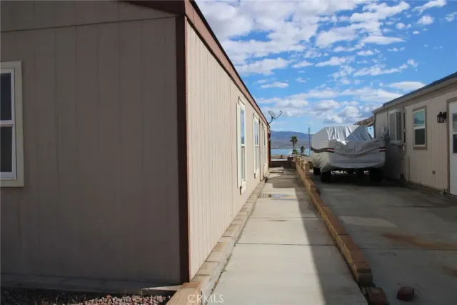 a view of a house with backyard
