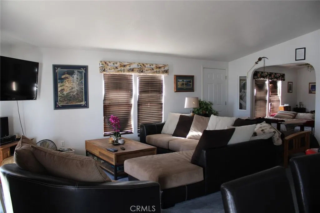 2 Havasu Lake Road Needles, CA 92363 - Photo 8 of 24 a living room with furniture and a flat screen tv