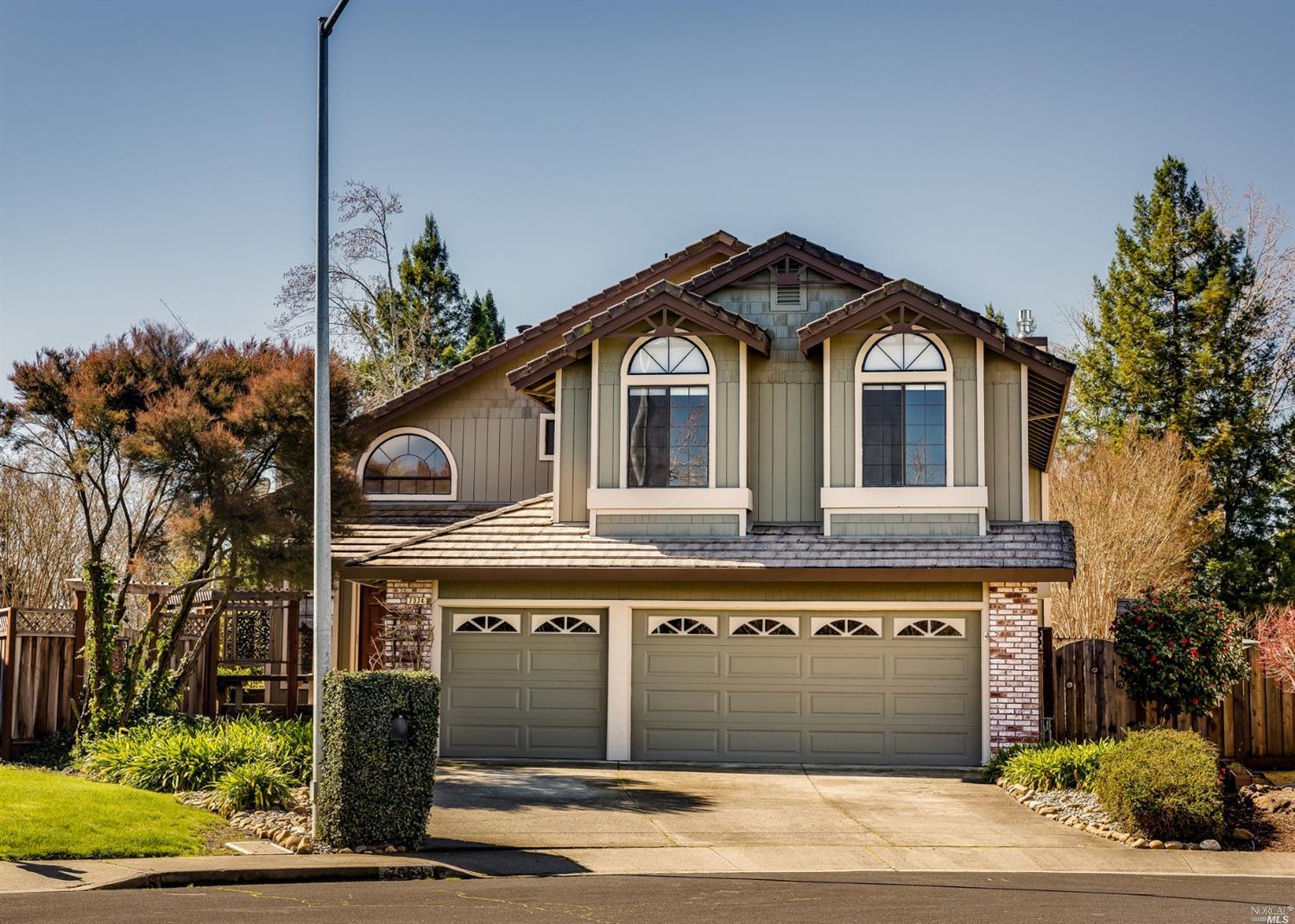 7374 Rasmussen Way Rohnert Park, CA 94928 - Photo 1 of 1 a front view of a house with a garden