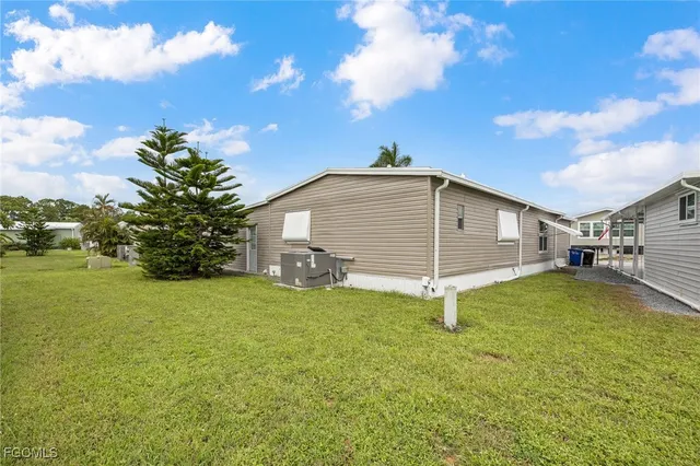 a view of a backyard of the house