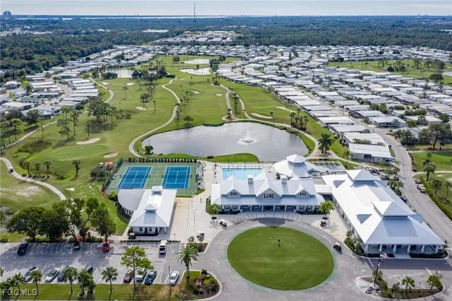 an aerial view of residential houses and outdoor space