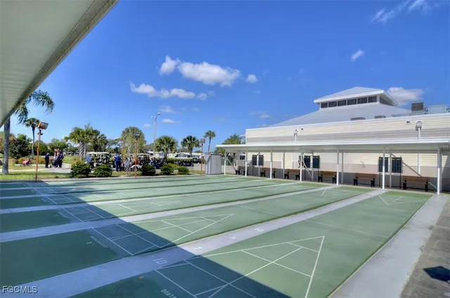 a view of a big building with that has a big yard