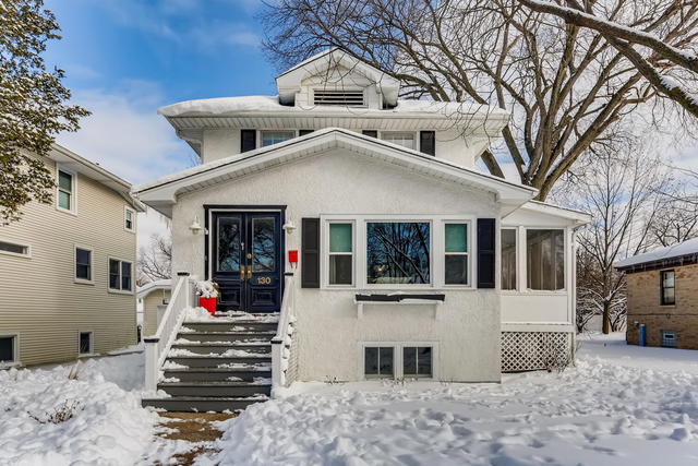 130 Southcote Road Riverside, IL 60546 - Photo 2 of 31 a front view of a house with a yard