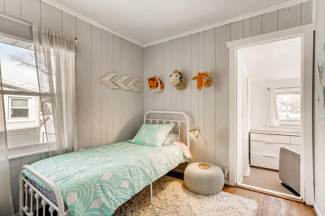 130 Southcote Road Riverside, IL 60546 - Photo 25 of 31 a bedroom with a bed and wooden floor