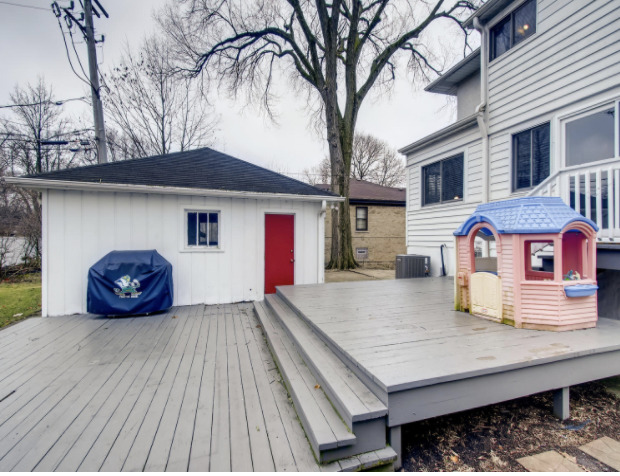 130 Southcote Road Riverside, IL 60546 - Photo 29 of 31 a wooden bench sitting in front of a building