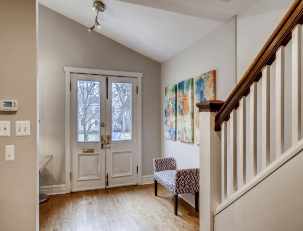 130 Southcote Road Riverside, IL 60546 - Photo 4 of 31 a view of entryway with wooden floor and stairs