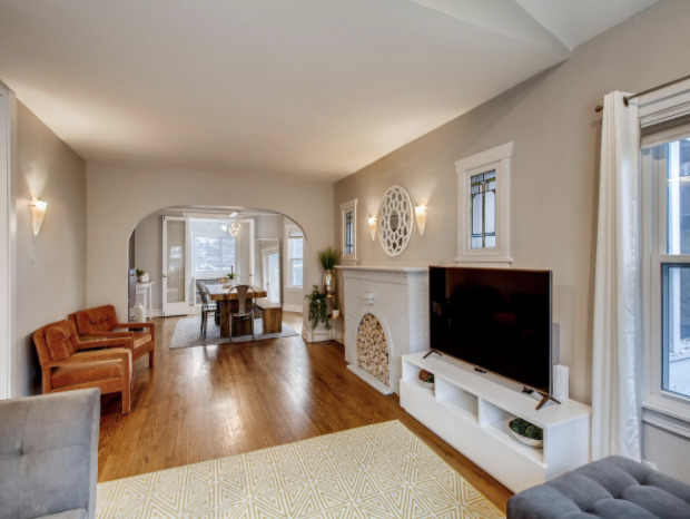 130 Southcote Road Riverside, IL 60546 - Photo 7 of 31 a living room with fireplace furniture and a flat screen tv