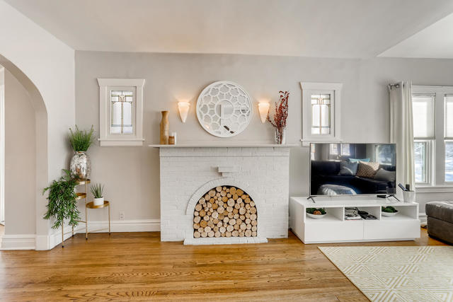 130 Southcote Road Riverside, IL 60546 - Photo 9 of 31 a living room with furniture a fireplace and decor