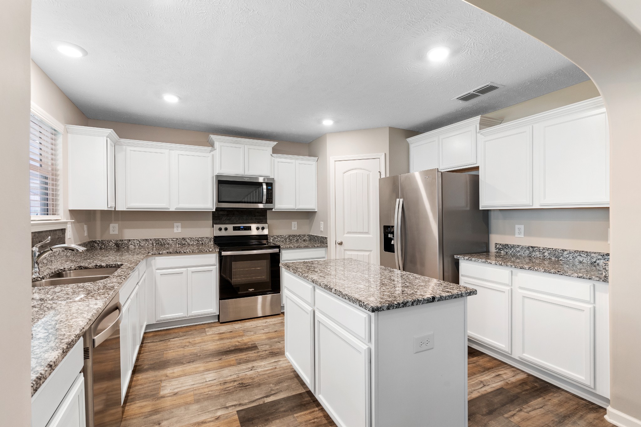 1626 Calcutta Drive Murfreesboro, TN 37128 - Photo 16 of 35 a kitchen with a sink stove and refrigerator