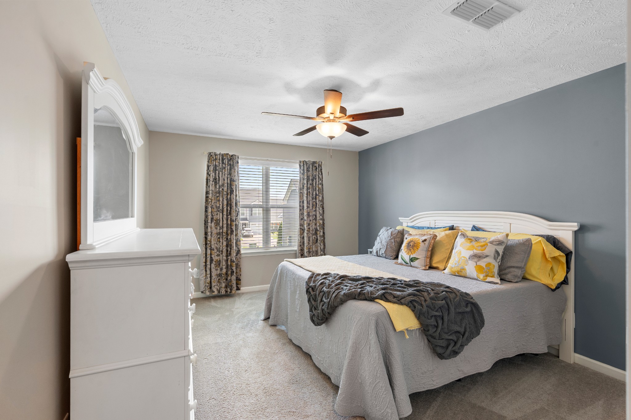 1626 Calcutta Drive Murfreesboro, TN 37128 - Photo 21 of 35 a bedroom with a bed and a chandelier