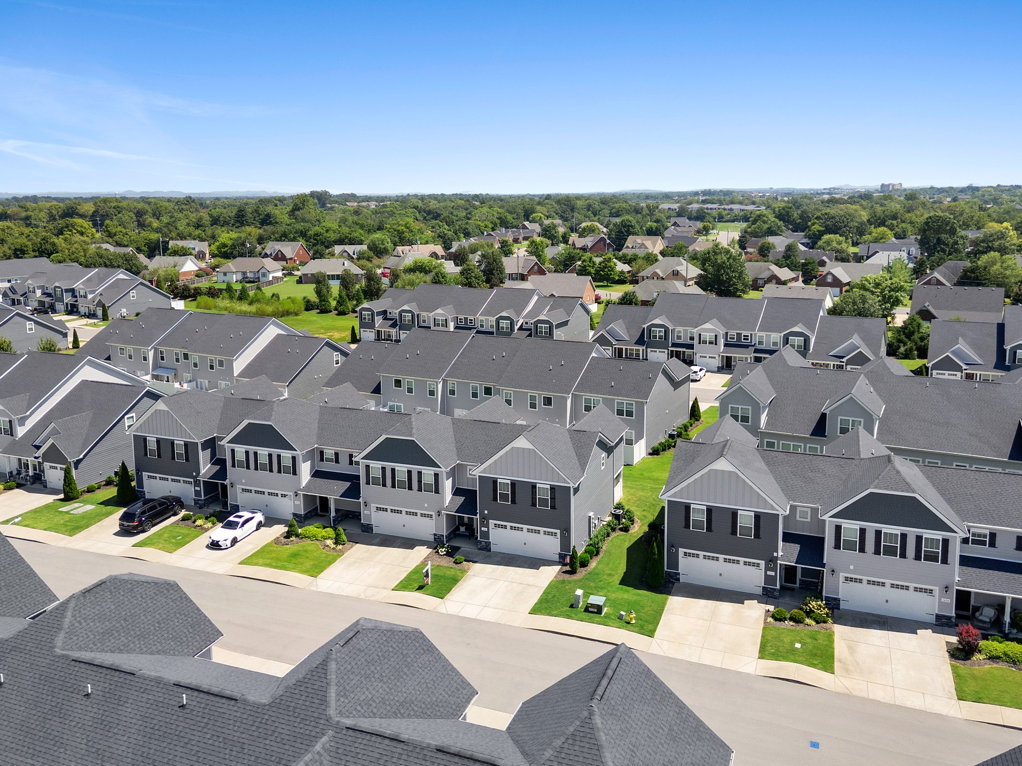 1626 Calcutta Drive Murfreesboro, TN 37128 - Photo 6 of 35 a view of multiple houses with a big yard